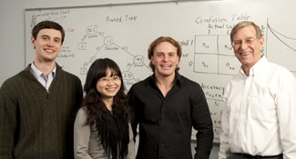 Jingjing Ye, Steven Gregory and Michael Fulmer of the SMU 2010 Data Mining Team with sponsor Professor Tom Fomby